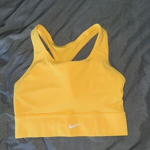 Bright yellow Nike longline sports bra
